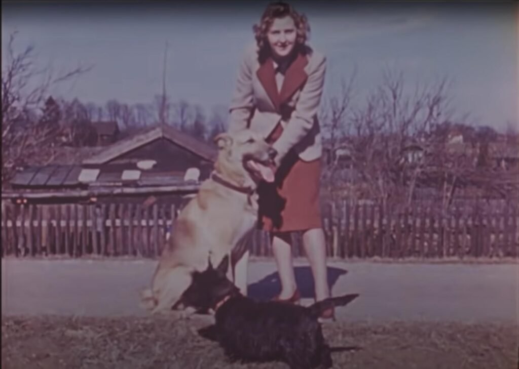 Eva Braun and her dog, color image