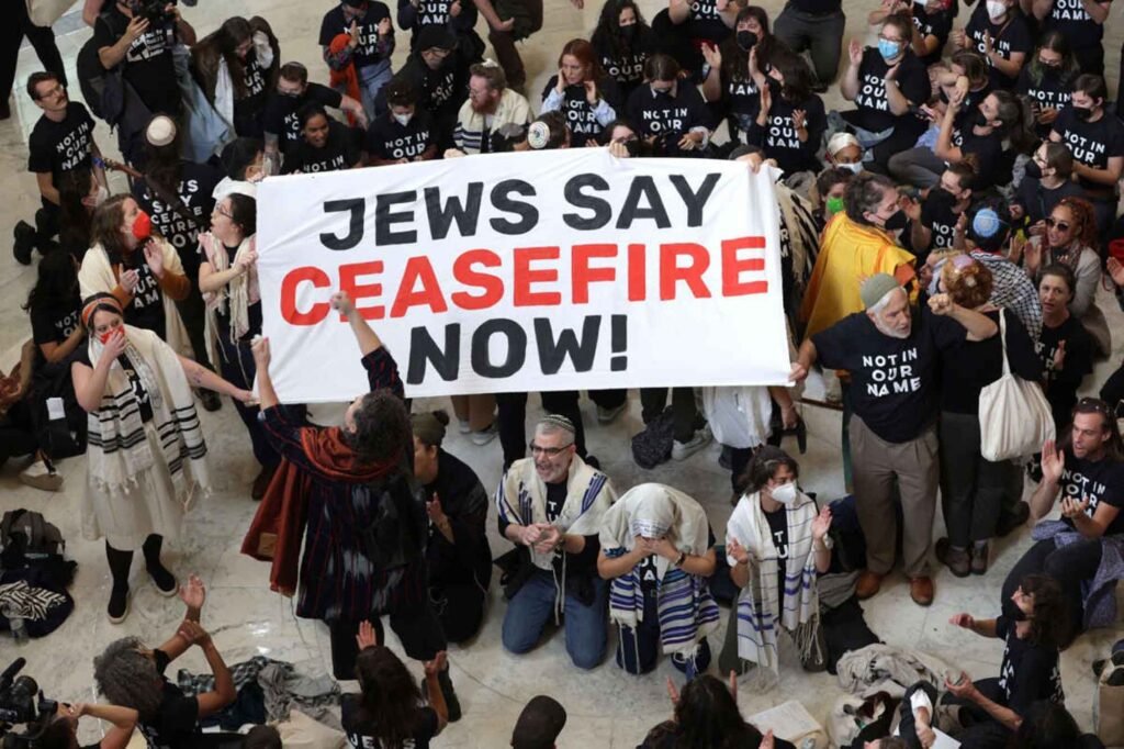 Members of Jewish Voice for Peace and IfNotNow hold a demonstration in support of a ceasefire in Gaza, Washington D.C.